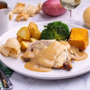 Petite Roast Pork, crackling, apple sauce and vegetables